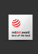 이미지에는 reddot award best of the best라는 텍스트가 포함되어 있습니다. 상단에는 빨간색 점이 여러 개 겹쳐진 로고가 있습니다. 배경은 어두운 색상입니다.