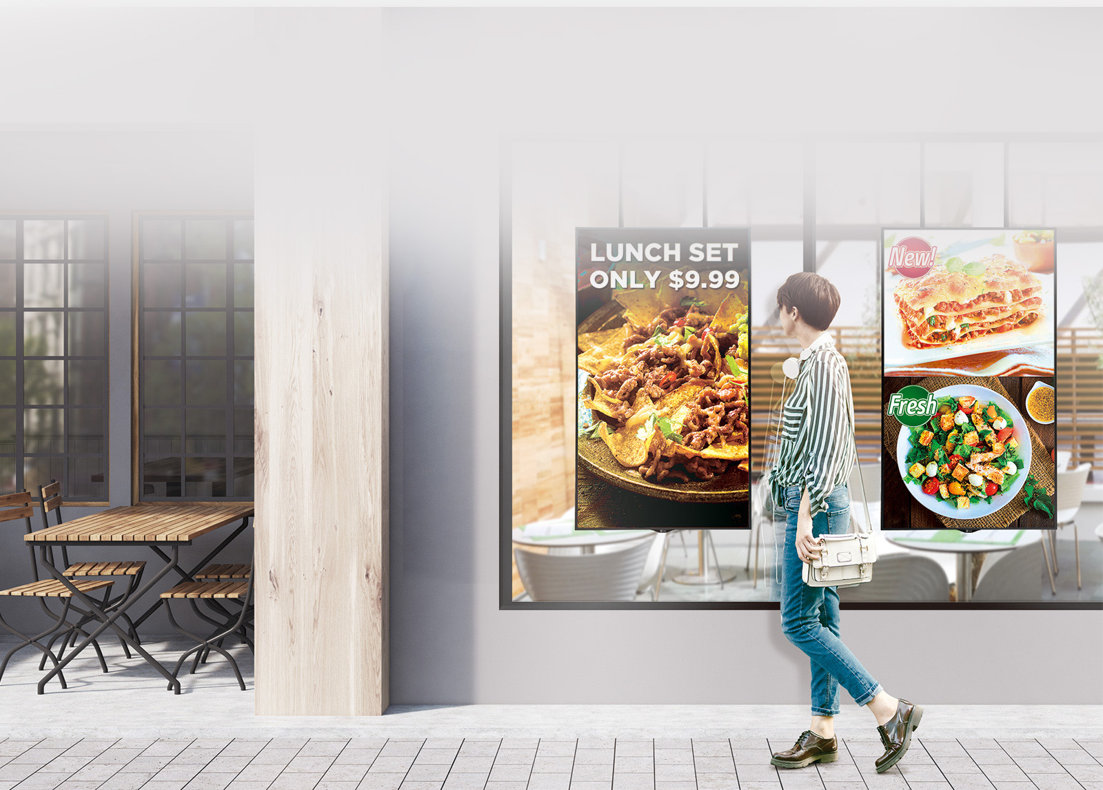 한 여성이 식당 앞을 지나가고 있으며, 창문에는 음식 광고가 붙어 있습니다. 광고에는 LUNCH SET ONLY $9.99라는 문구와 함께 나초와 고기가 담긴 요리 이미지가 보입니다. 다른 광고에는 New!라는 문구와 함께 라자냐 이미지가 있으며, Fresh라는 문구와 함께 샐러드 이미지도 있습니다. 식당 내부는 나무 테이블과 의자가 놓여 있는 모습입니다.