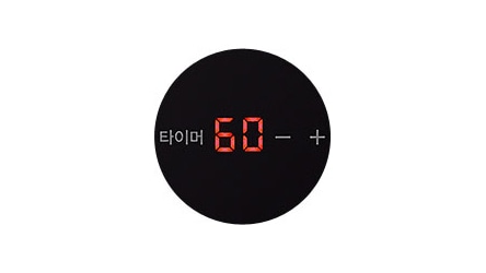 검은색 원형 배경에 빨간색 디지털 숫자와 글자가 표시되어 있습니다. 타이머 60 - +라는 텍스트가 보입니다.