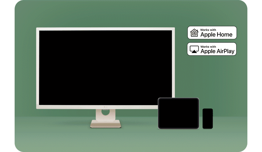 lg_myview_스마트_모니터가_나무_가구_위에_놓여_있으며,_화면에는_다양한_스트리밍_서비스_아이콘이_표시되어_있습니다._모니터_옆에는_액자와_꽃병이_놓여_있고,_앞쪽에는_책이_펼쳐진_테이블이_있습니다.