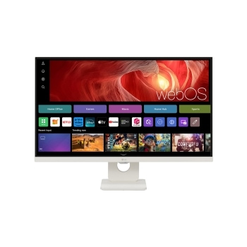 모니터 화면에 웹OS 인터페이스가 표시되어 있습니다. 화면 상단에는 "webOS"라는 텍스트가 있으며, 그 아래에는 "Home Office", "Games", "Music", "Home Hub", "Sports" 등의 메뉴가 있습니다. 다양한 앱 아이콘이 보이며, "Recent Input" 및 "Trending now" 섹션이 포함되어 있습니다. 배경은 회