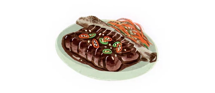 접시에 갈비와 고추가 올려져 완성된 우대갈비 요리가 담긴 모습