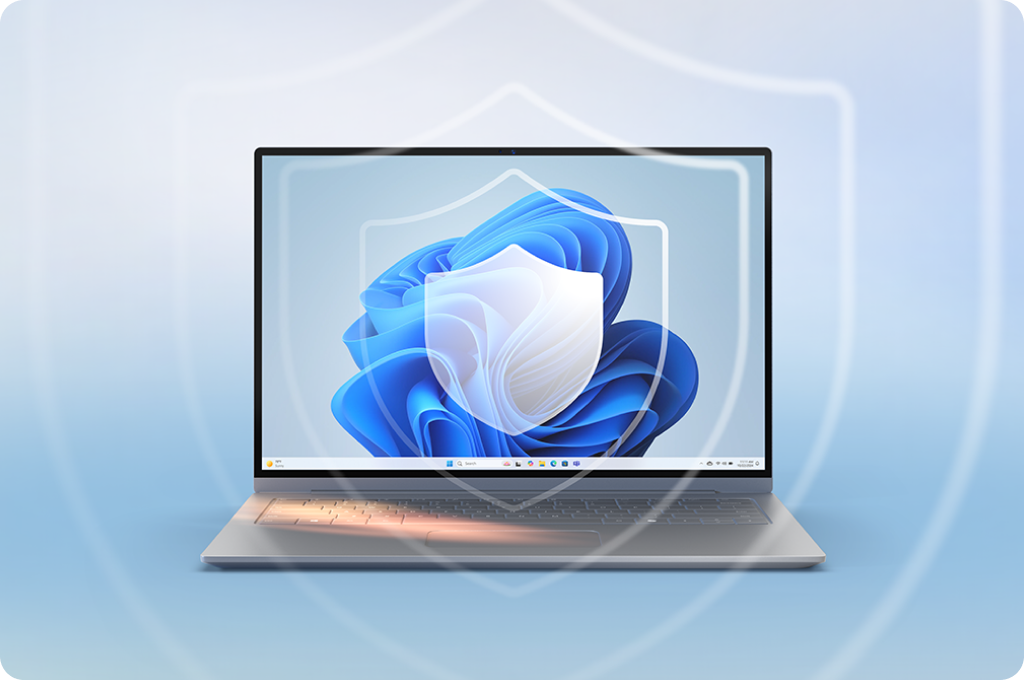 화면에 보호막 모양 아이콘이 겹쳐진 노트북 이미지. Windows 보안 기능이 강화된 제품임을 시각적으로 표현함.