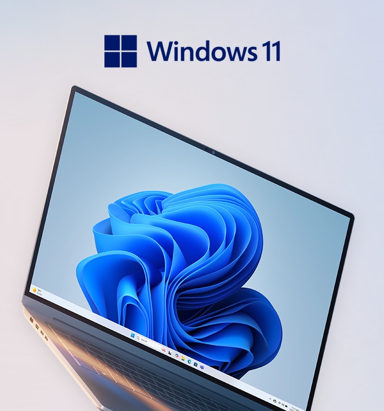 푸른색 그러데이션 배경 위에 Windows 11 로고와 함께 얇고 세련된 노트북이 비스듬히 놓여 있는 모습. 최신 Windows 11이 탑재된 제품임을 강조함.