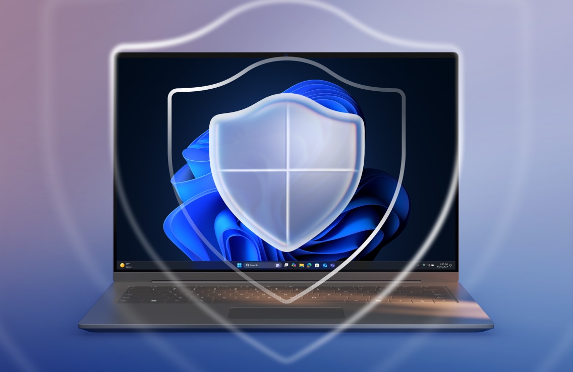 노트북 화면 앞에 Windows 배경화면이 표시된 노트북 위로 방패 형태의 보안 아이콘이 겹쳐져, PC 보안 기능과 보호 성능을 강조한 이미지.