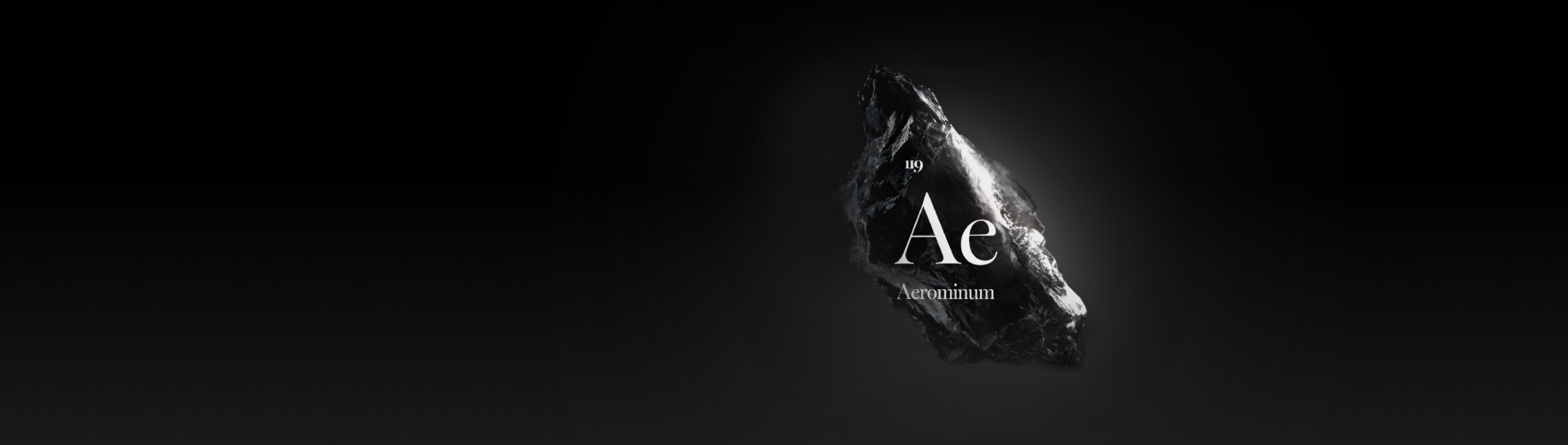 검정색 배경에 우측에 검은색 돌 조각 위에 'Ae Aerominium 119' 텍스트가 흰색으로 표시되어 있다.